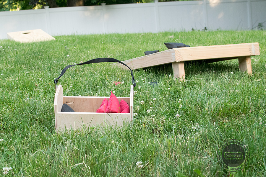 Cornhole bean bag tote with cornhole boards