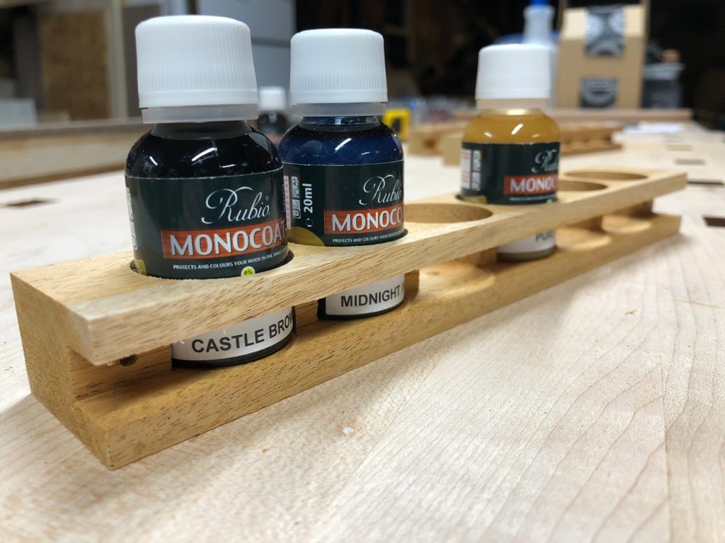 rubio monocoat racks with bottles